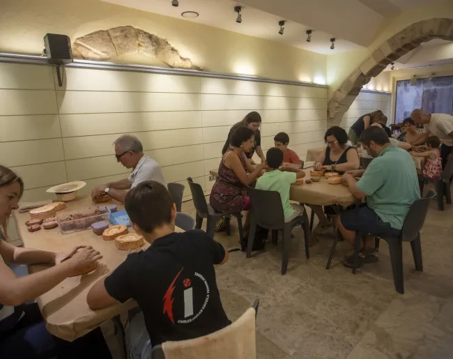 Viatges en el temps | Taller de llànties romanes